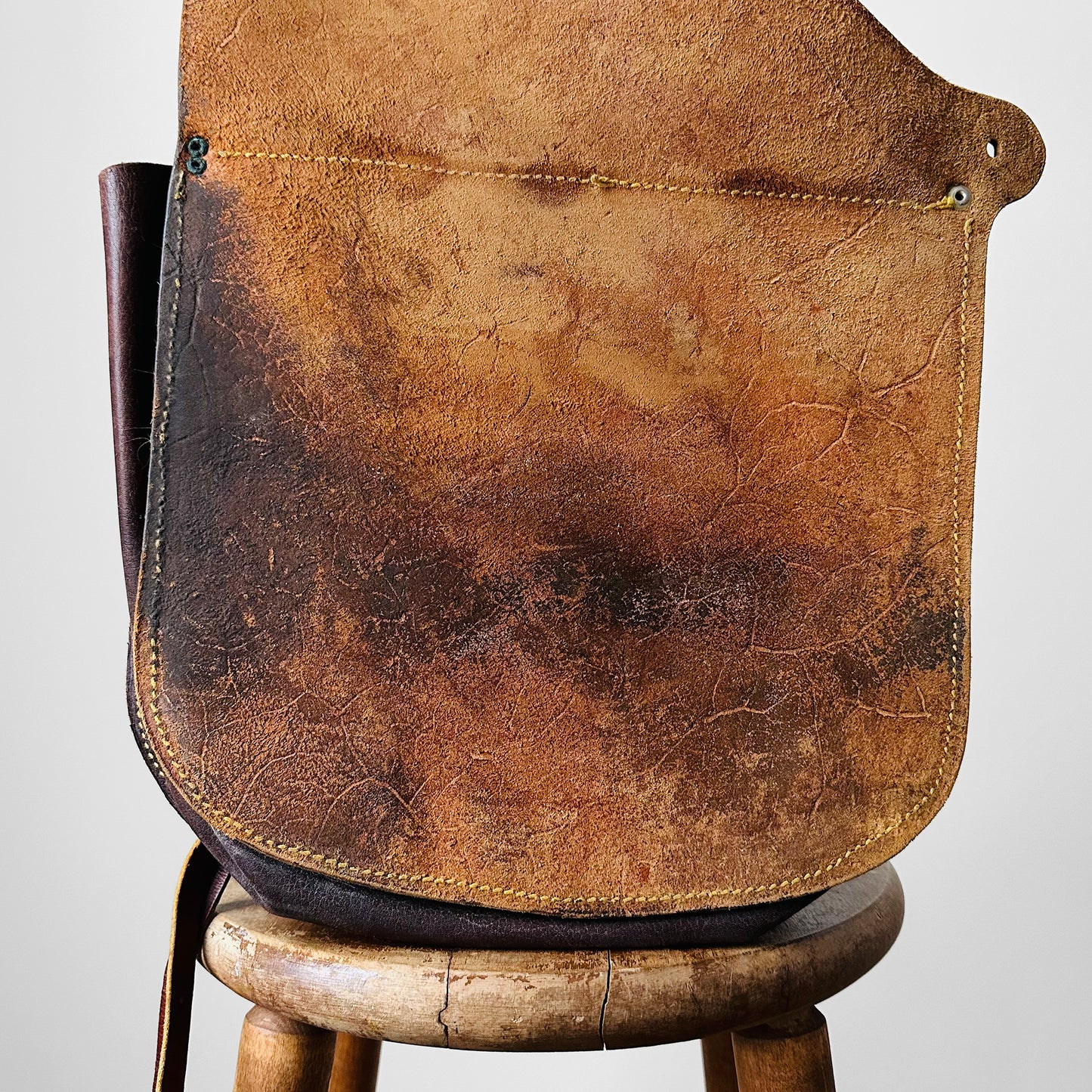 Vintage Mid-Century Amber Well-Worn Floral Tooled-Leather Saddlebags