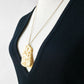 1960s Mid-Century Carved Celluloid Floral Motif Gold-tone Chain Pendant Necklace