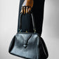 1940s - 1950s Black Leather Handbag with Brass Accents