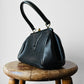 1940s - 1950s Black Leather Handbag with Brass Accents
