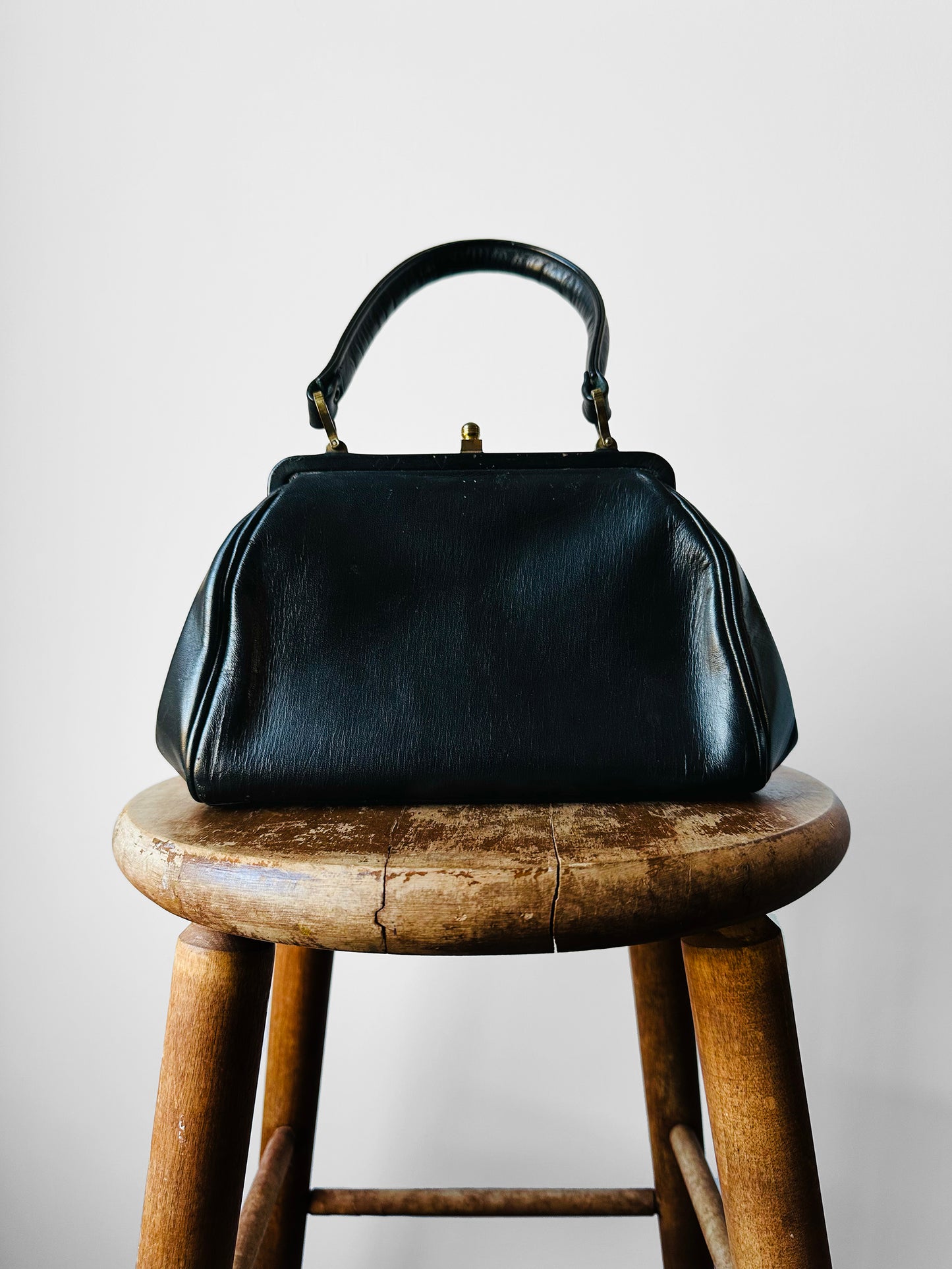 1940s - 1950s Black Leather Handbag with Brass Accents