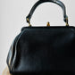 1940s - 1950s Black Leather Handbag with Brass Accents