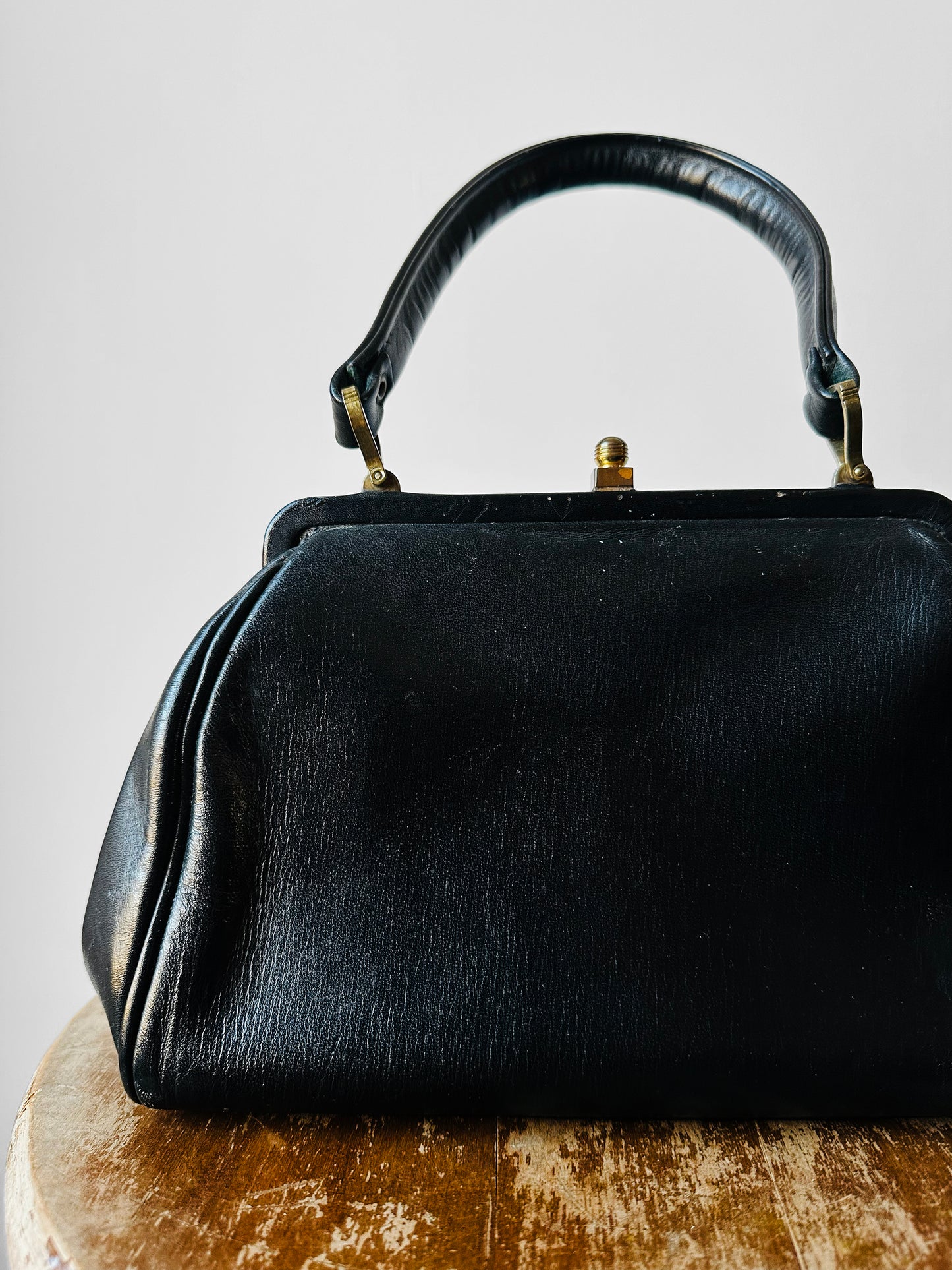 1940s - 1950s Black Leather Handbag with Brass Accents