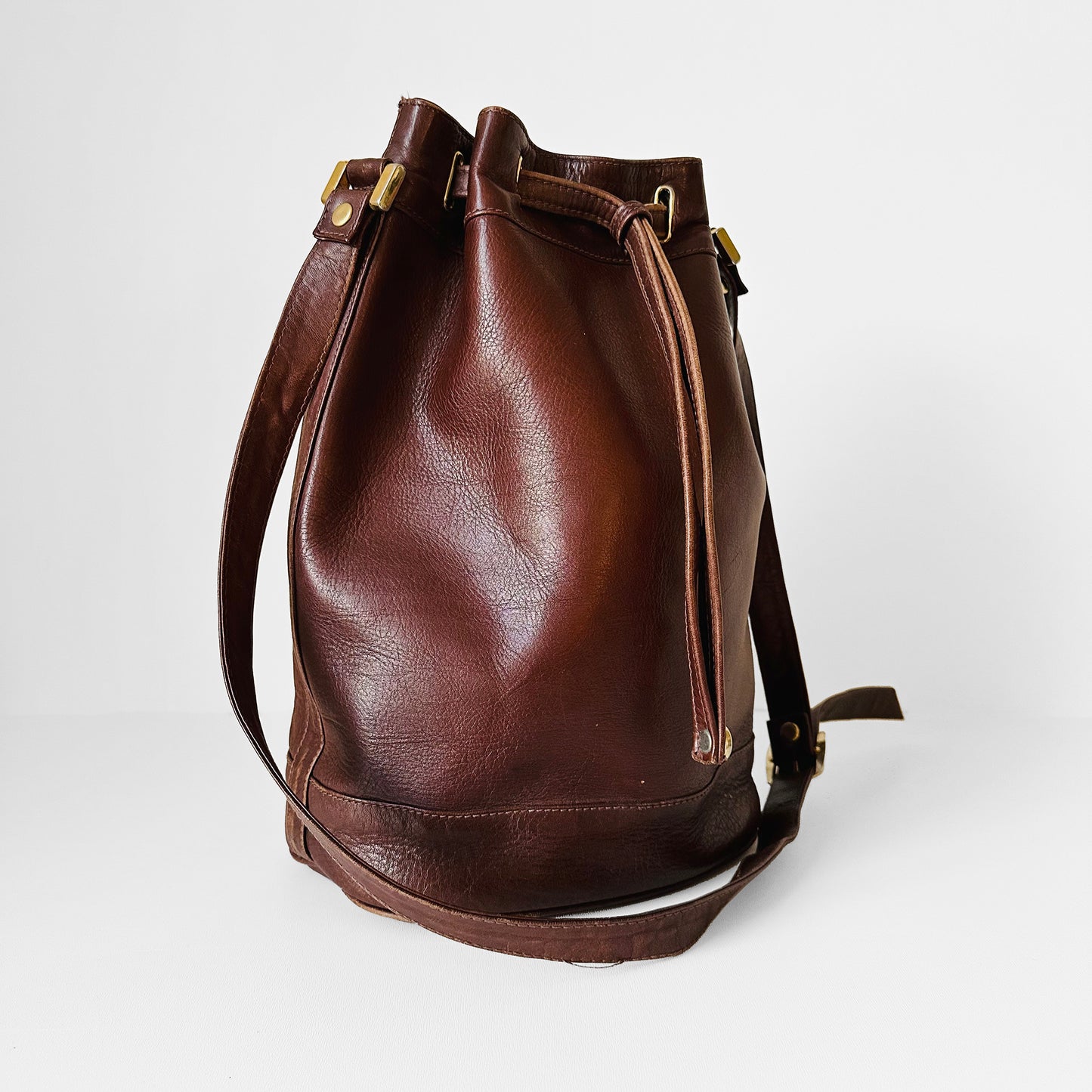 1970s Saddle Brown Buttery Soft Leather Cinch Top Bucket Crossbody Bag