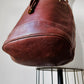 1970s Saddle Brown Buttery Soft Leather Cinch Top Bucket Crossbody Bag