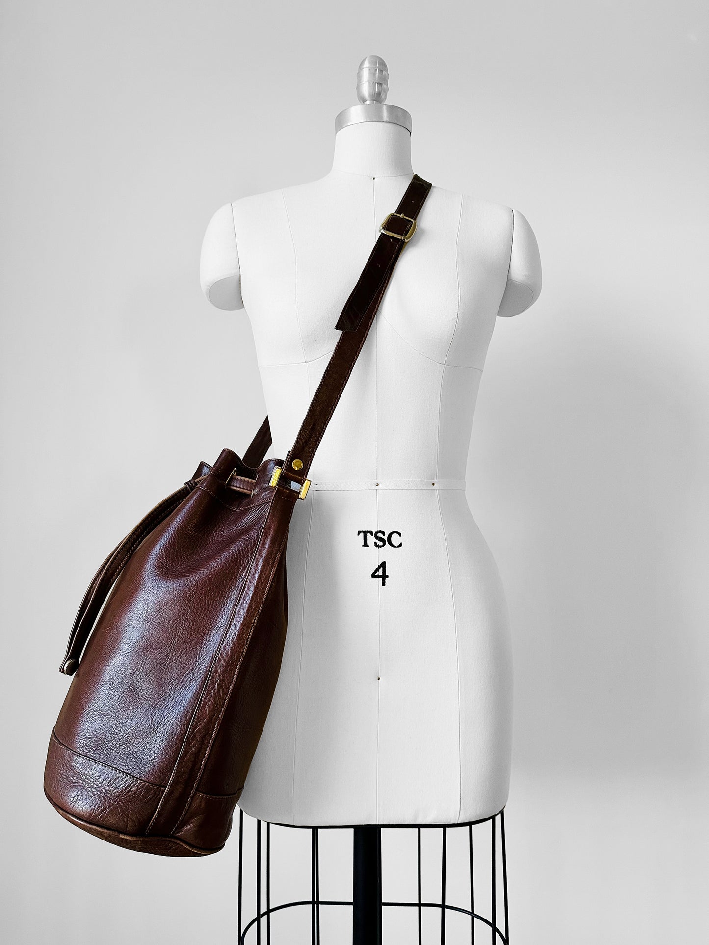 1970s Saddle Brown Buttery Soft Leather Cinch Top Bucket Crossbody Bag