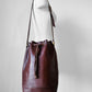 1970s Saddle Brown Buttery Soft Leather Cinch Top Bucket Crossbody Bag