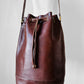 1970s Saddle Brown Buttery Soft Leather Cinch Top Bucket Crossbody Bag