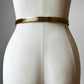 1980s Gold Toned Narrow Metal Scaled Stretch Belt