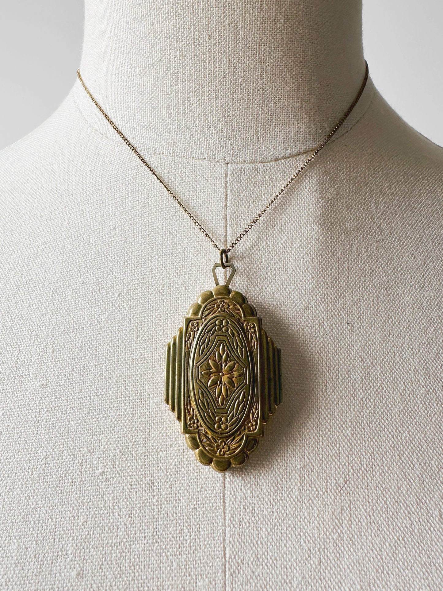 Antique 1920s - 1930s Tarnished Gold-Toned Locket Necklace with Floral Relief
