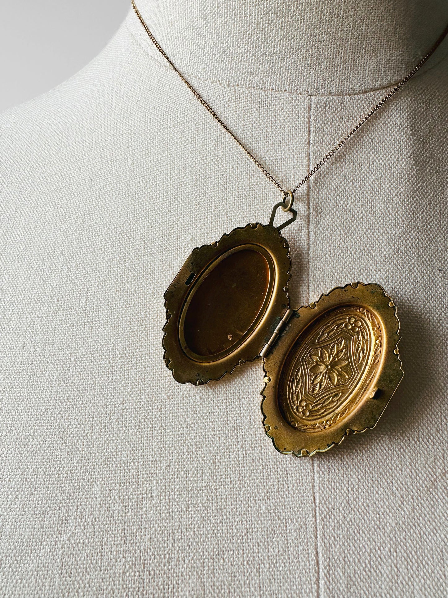 Antique 1920s - 1930s Tarnished Gold-Toned Locket Necklace with Floral Relief