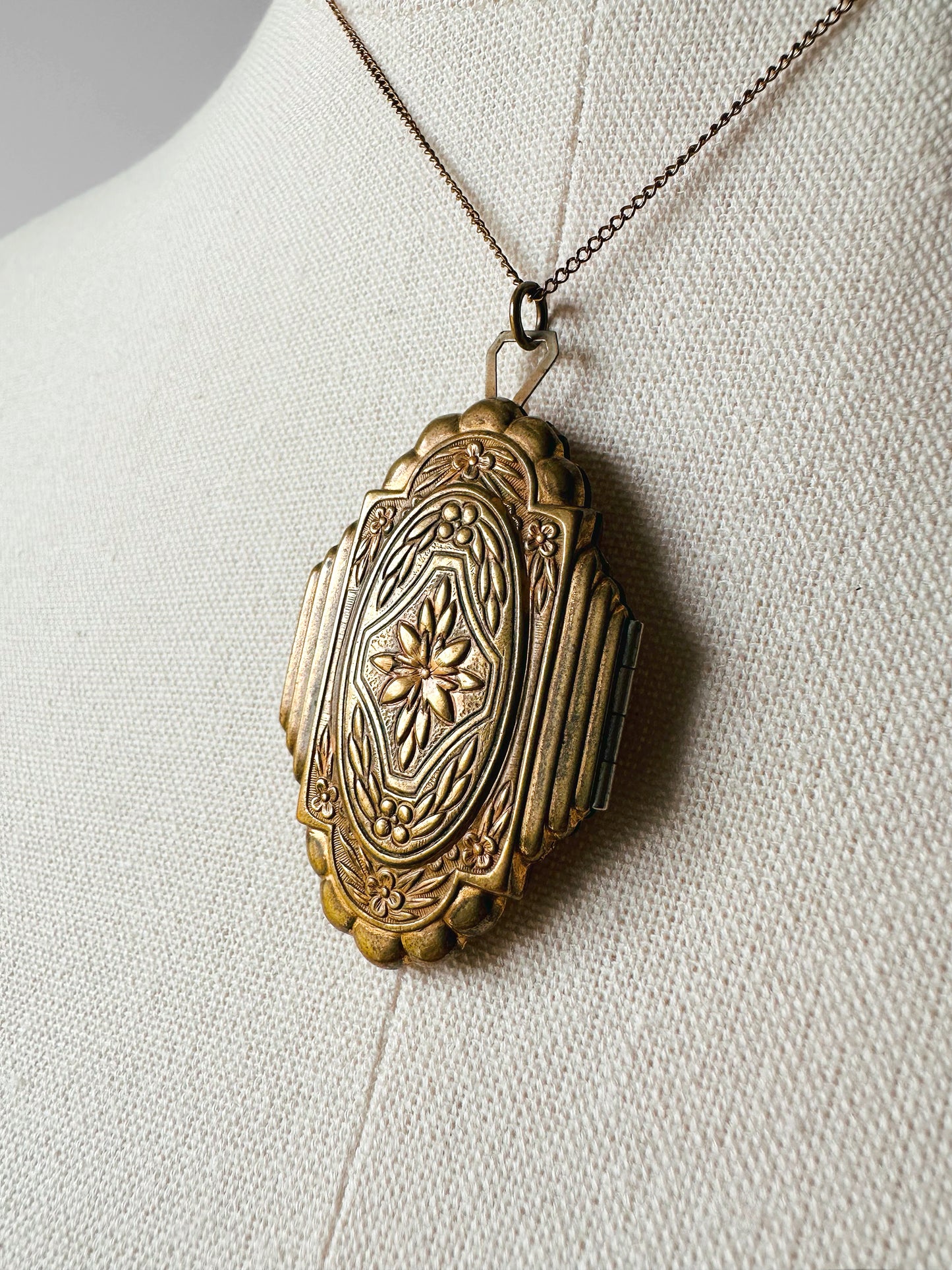 Antique 1920s - 1930s Tarnished Gold-Toned Locket Necklace with Floral Relief