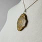 Antique 1920s - 1930s Tarnished Gold-Toned Locket Necklace with Floral Relief