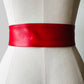 1980s Wide Profile Cherry Red Round Buckle Faux Leather Slip Belt