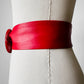 1980s Wide Profile Cherry Red Round Buckle Faux Leather Slip Belt