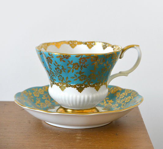 1950s Royal Albert Turquoise and Gold Floral Patterned Teacup and Saucer Set