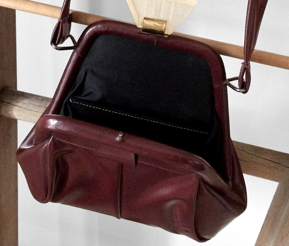 1960s Burgundy Pyramid Clasp Faux Leather Handbag