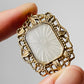 1920s Art Deco Filigree Gold-Toned Camphor Glass Pendant