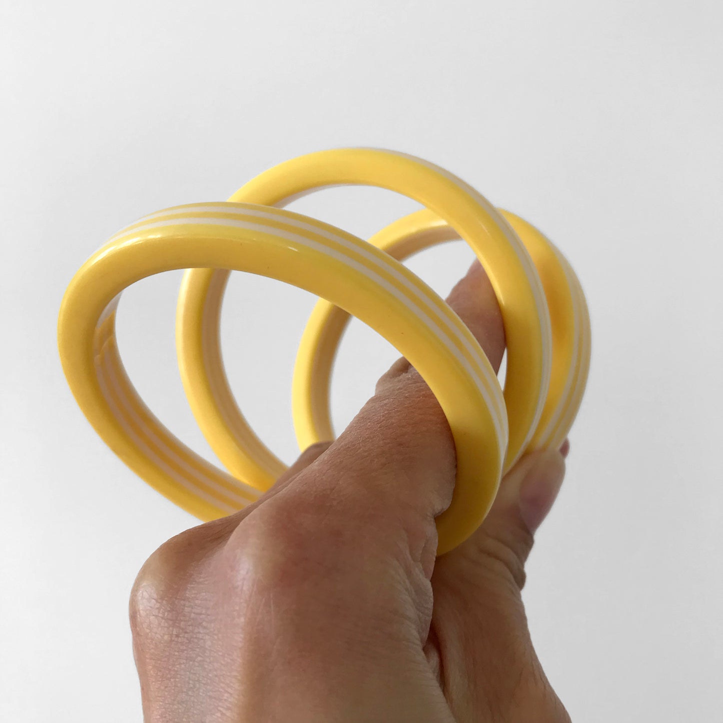 1960s Yellow and White Candy Stripe Bangle Bracelets