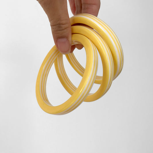 1960s Yellow and White Candy Stripe Bangle Bracelets