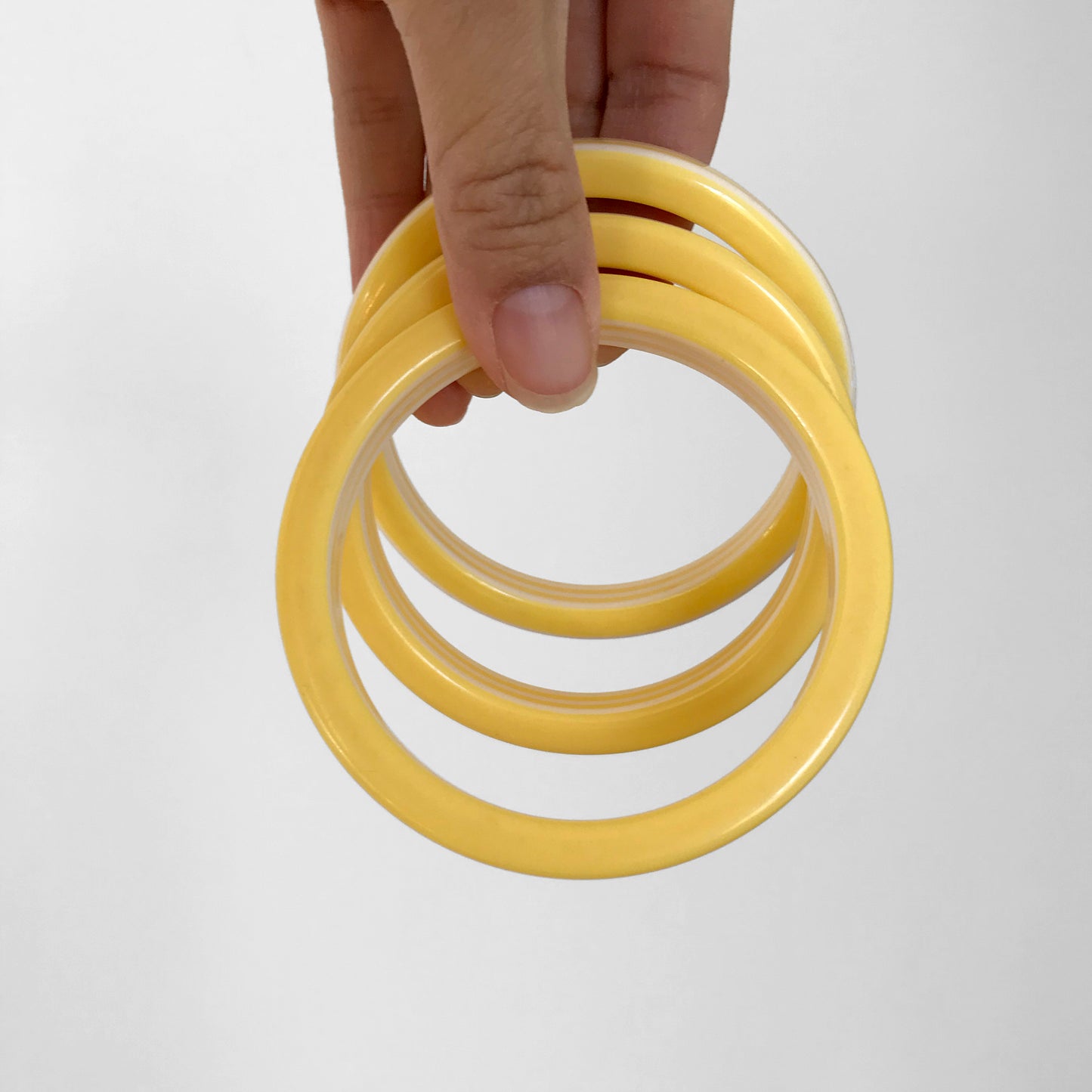 1960s Yellow and White Candy Stripe Bangle Bracelets