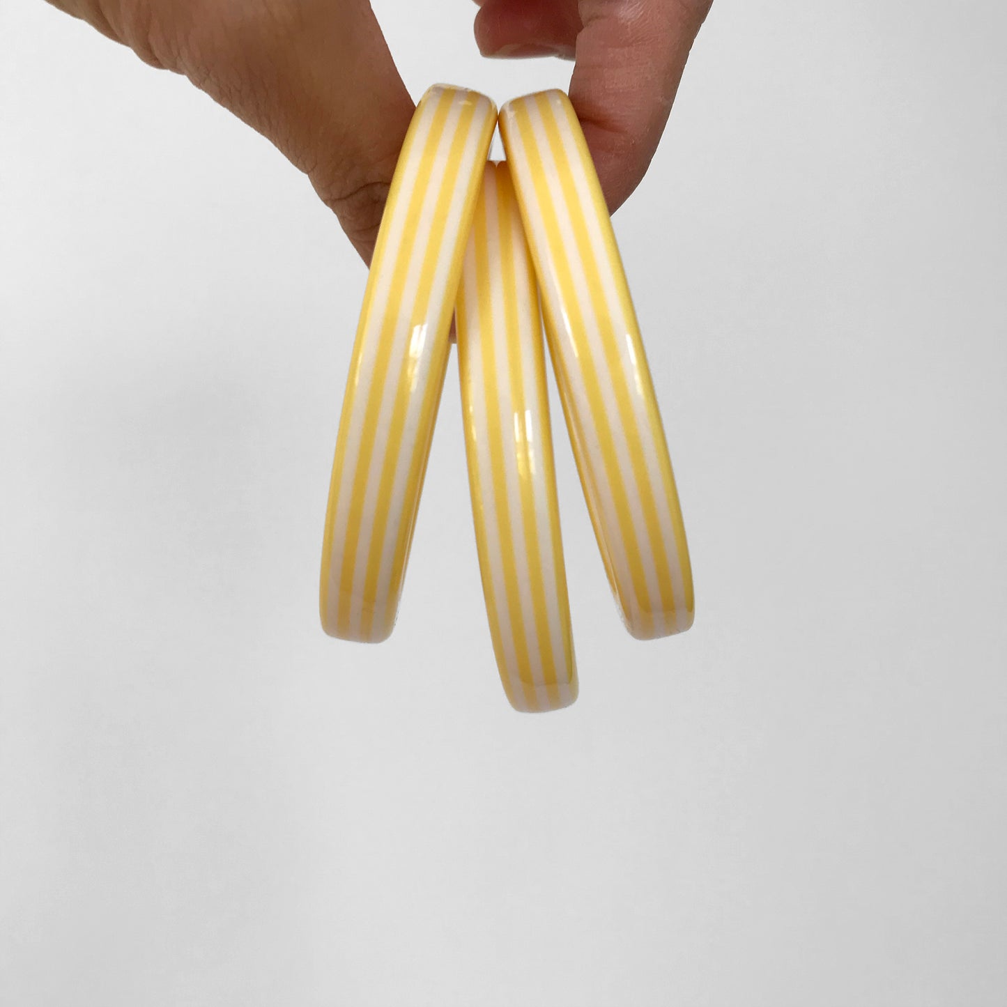 1960s Yellow and White Candy Stripe Bangle Bracelets