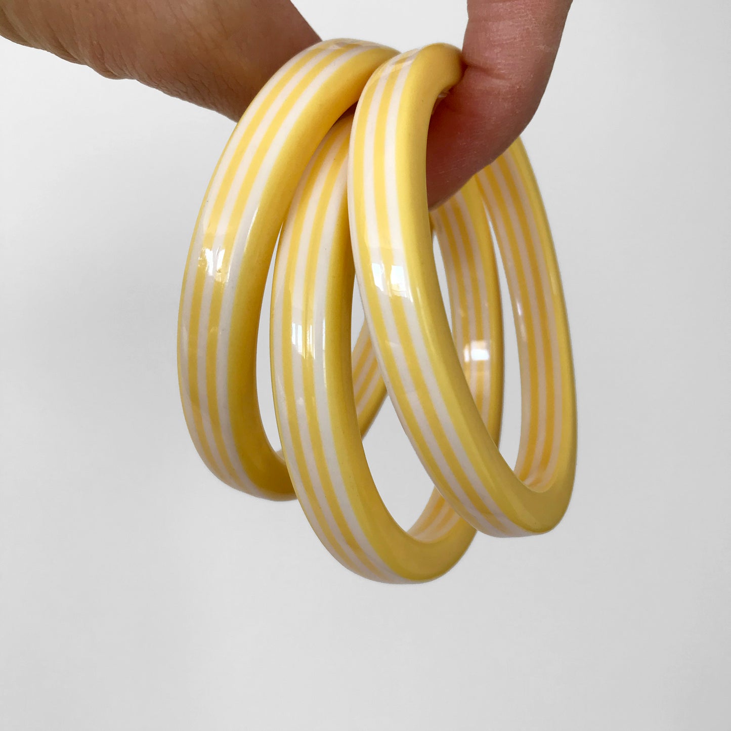 1960s Yellow and White Candy Stripe Bangle Bracelets