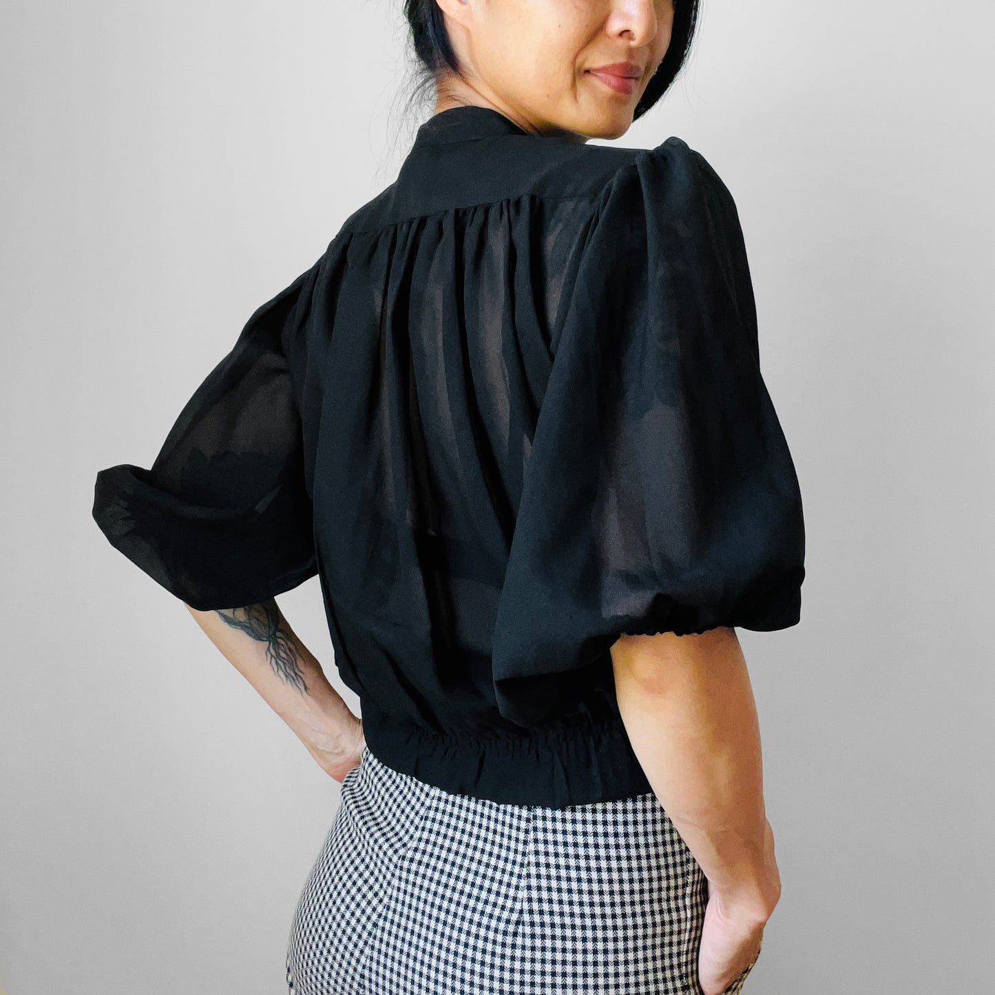 1960s Black Sheer Montreal Made in Canada Puff-Sleeve Button-Front Peplum Blouse