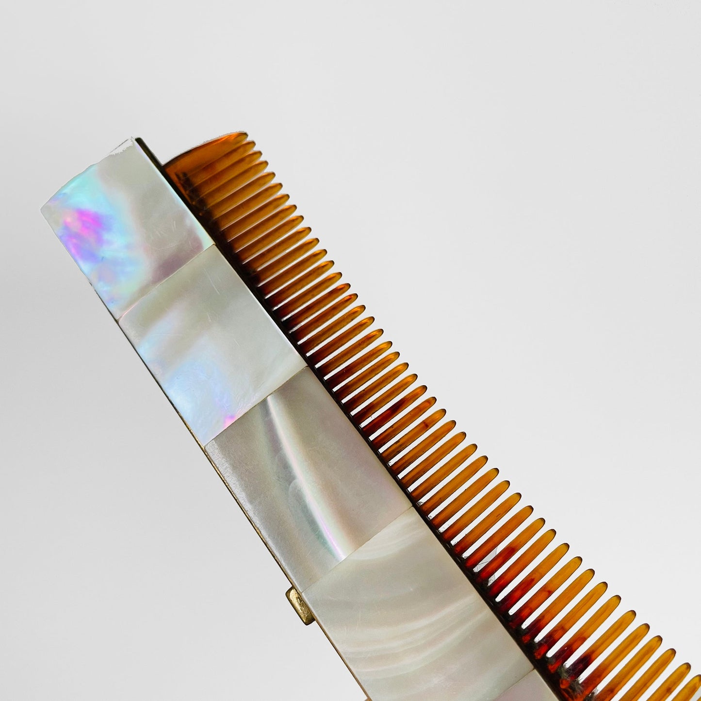 Abalone and Brass Retractable Comb