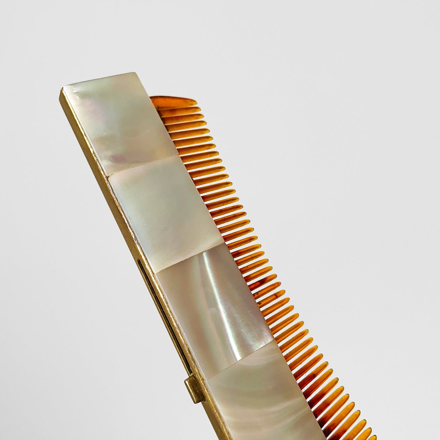 Abalone and Brass Retractable Comb