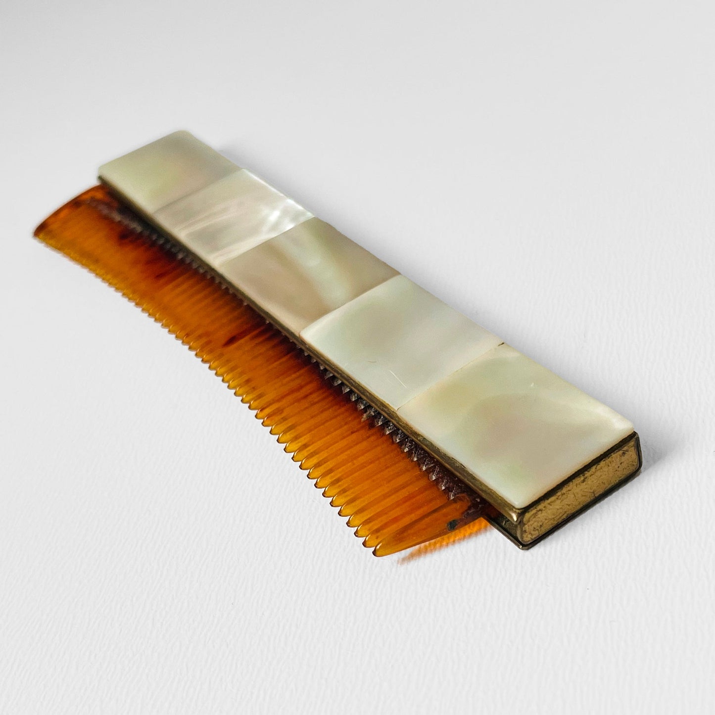 Abalone and Brass Retractable Comb