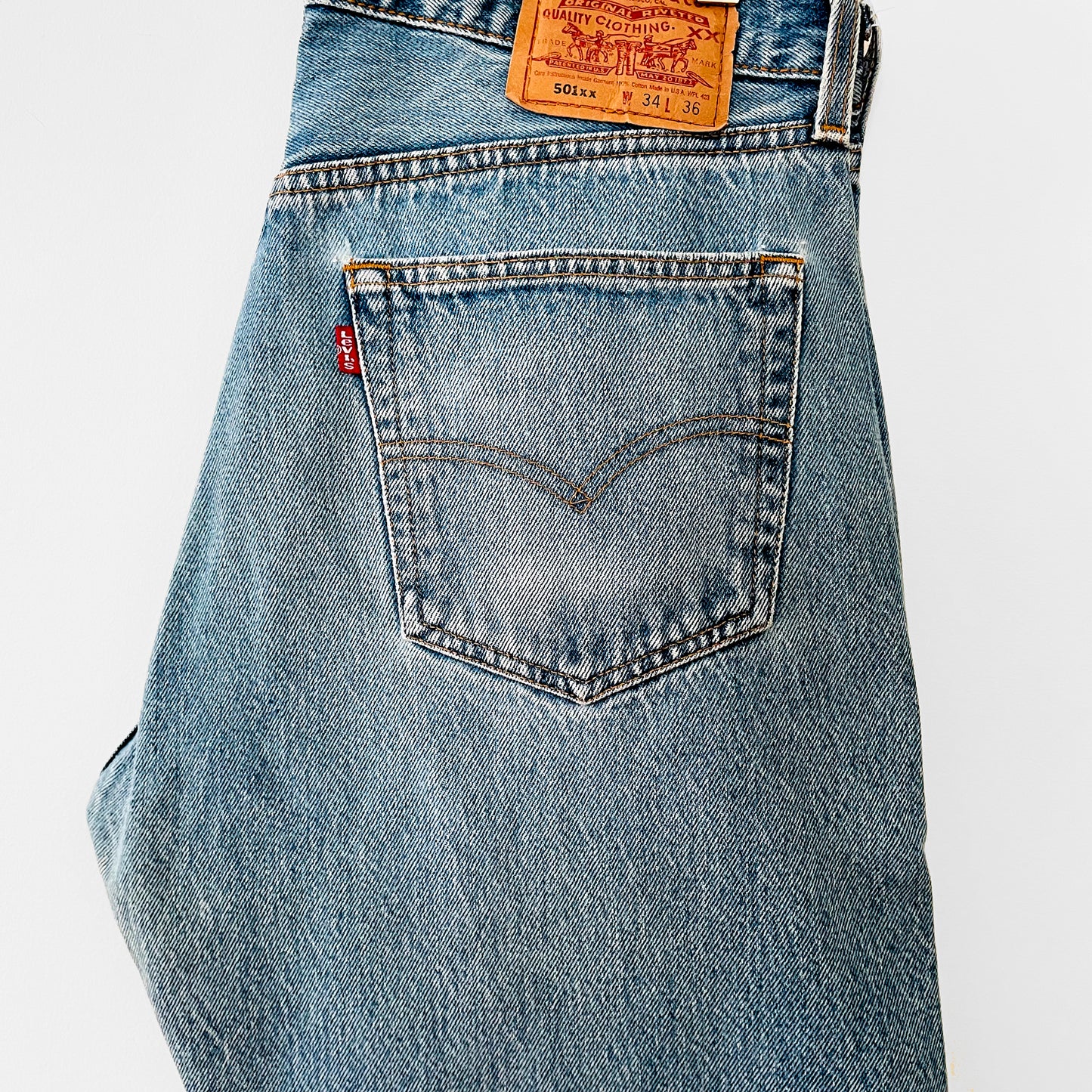 1980s - 1990s Made in the USA Levi's 501XX Button-Fly Light-Wash Red-Tab Distressed Well-Worn Denim Jeans - Waist 33-34