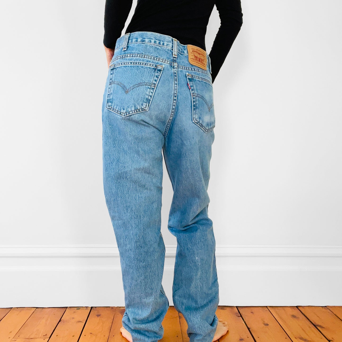 1980s Made in Canada Distressed Well-Worn Light-Wash Red Tab Levi's Denim Jeans