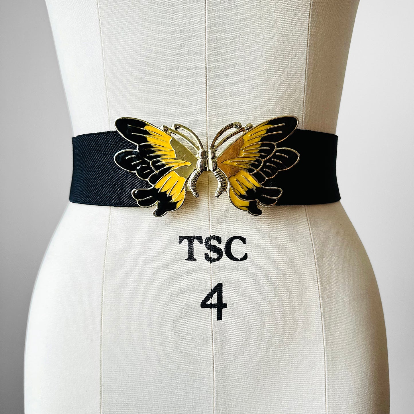 1980s Black Stretch Waist Adjustable Enamelled Metal Butterfly Belt