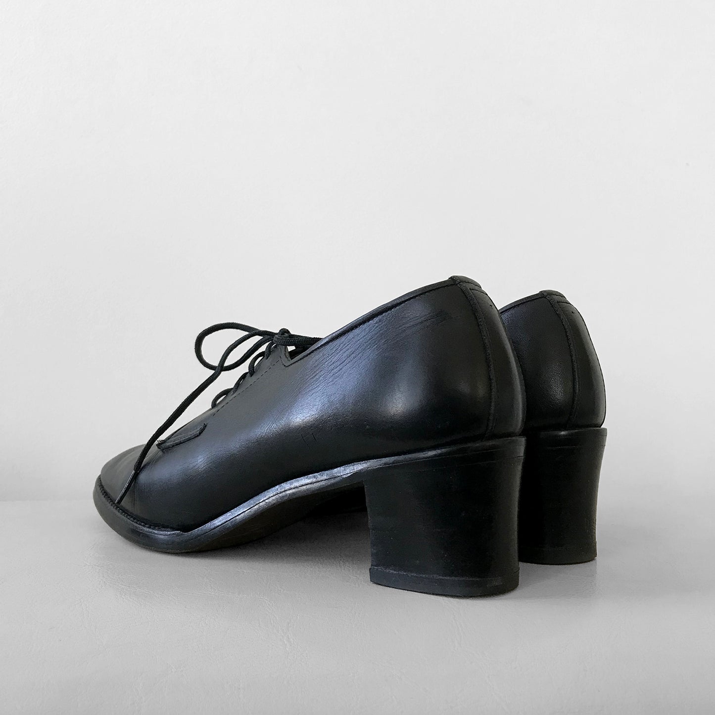 1960s Well Worn French Black Leather Heeled Lace-Up Shoes