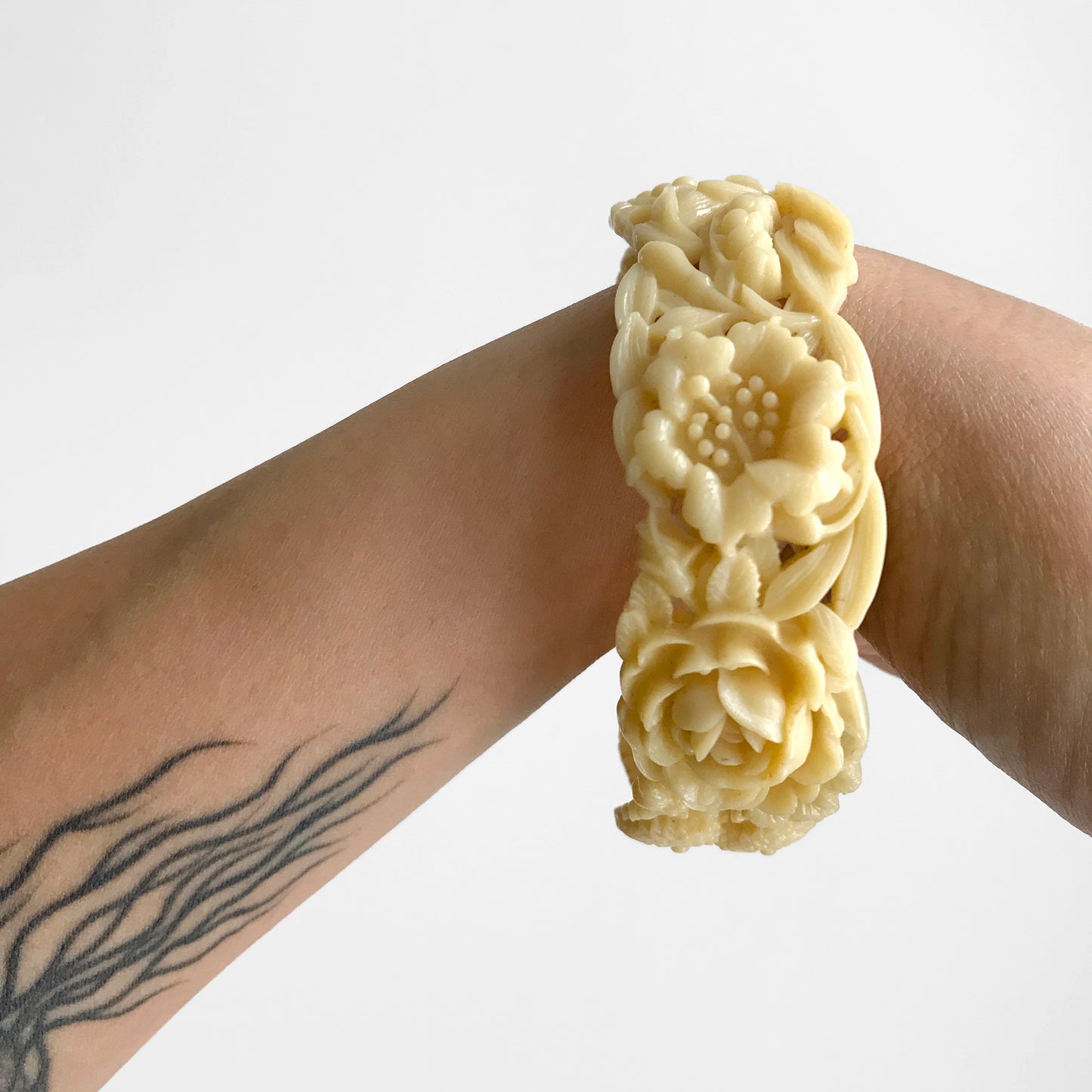 1930s Creamy Egg-Shell Yellow Carved Floral and Bird Celluloid Bangle Bracelet