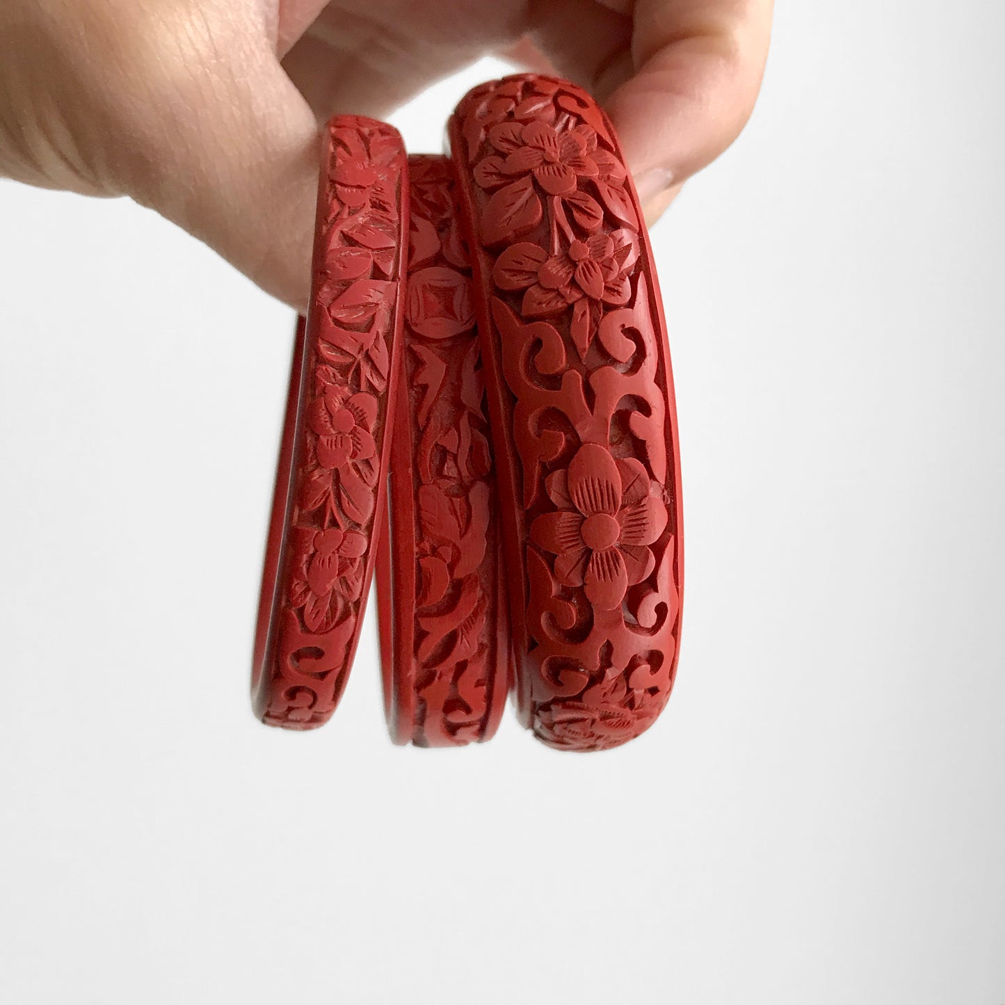 Antique early 1900s, Red Chinese Cinnabar Floral Carved Bangle Bracelet Set