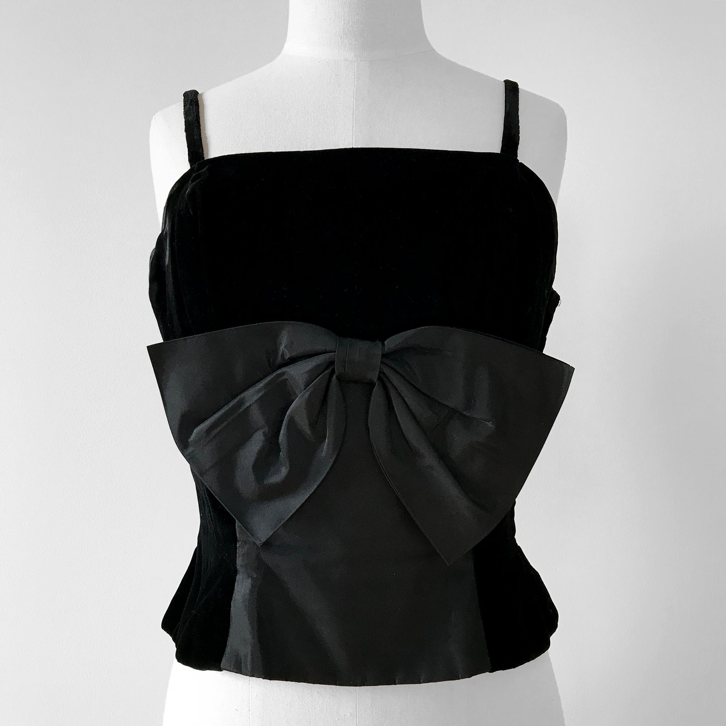 1960s Black Velvet and Taffeta Bow Front Side-Zip Peplum Sleeveless Top