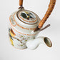 1980s Made in Korea Bird on a Branch Patterned Ceramic Teapot with Warming Base